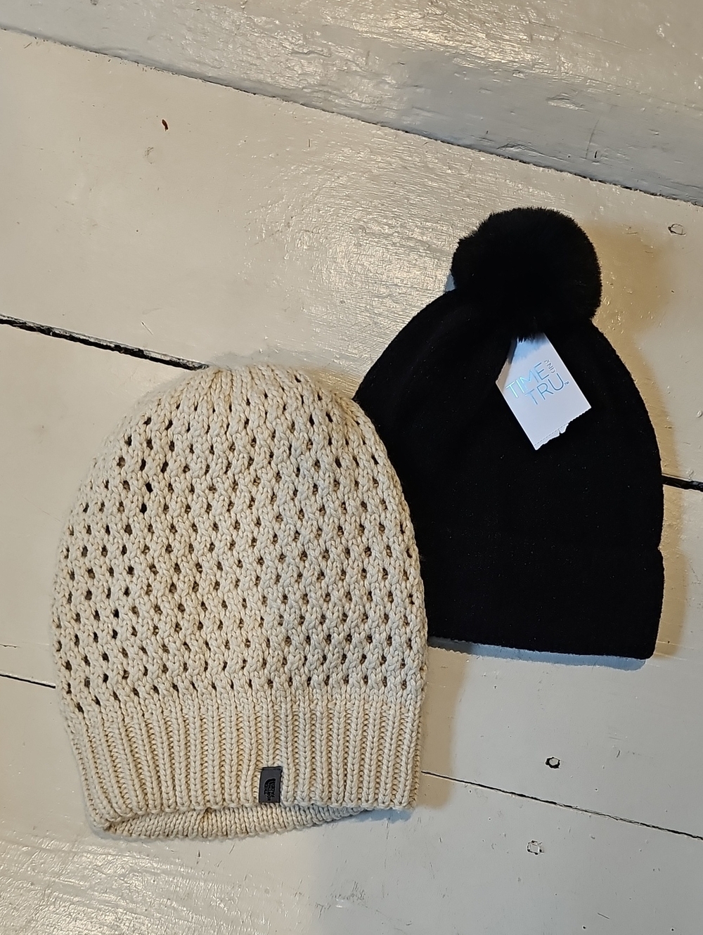 The North Face Cream Knit Slouch Hat & Time And True Black Pom Beanie